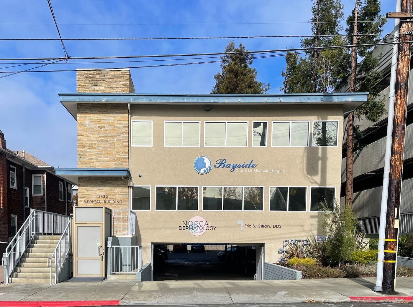 The office building at 2435 Webster Street in Berkeley, with the NorCal Dermatology Group sign beside the entrance